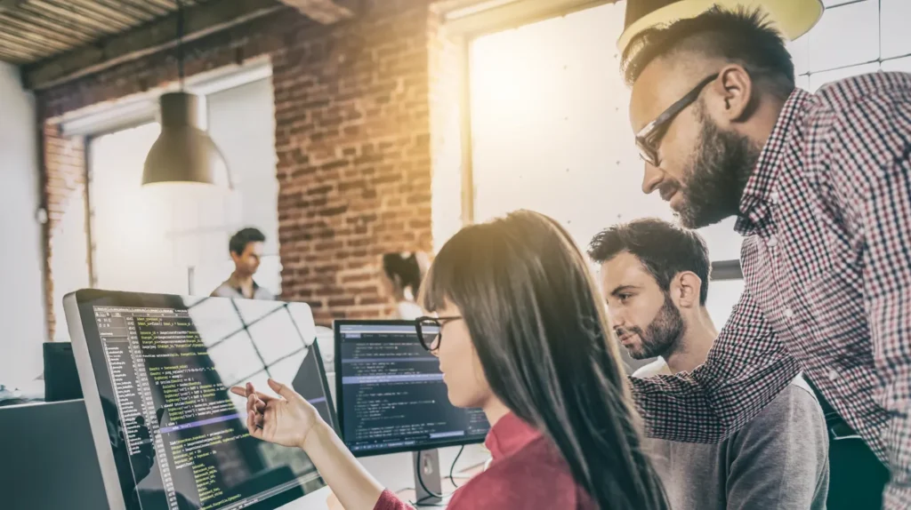 Picture of Team Working on Computer